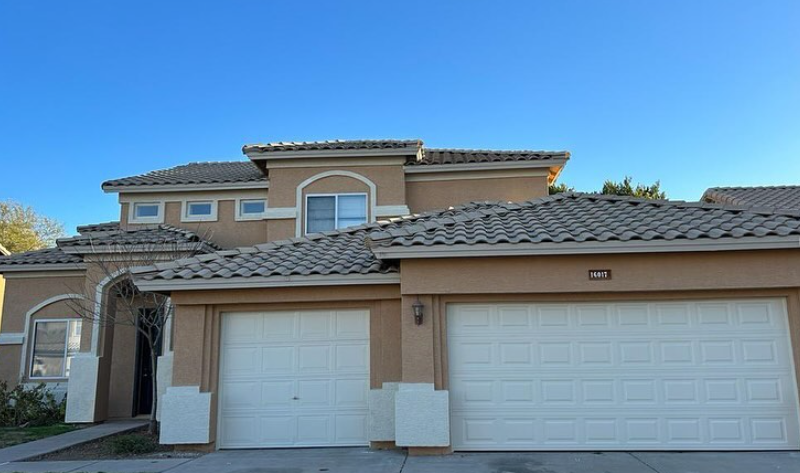 Residential exterior repaint — traditional stucco