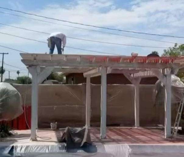 Residential exterior repaint — pergola and patio