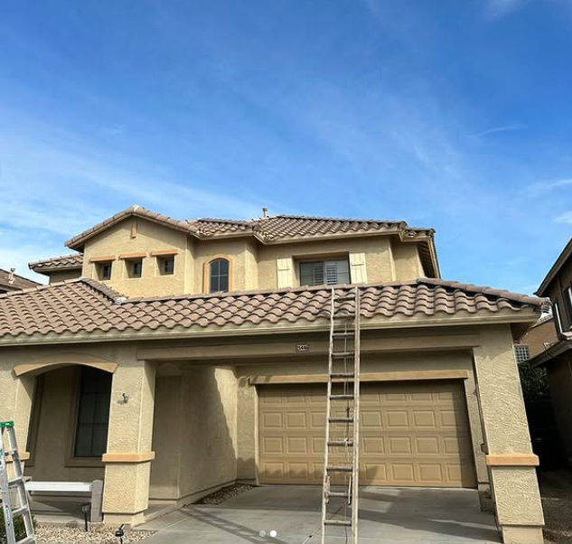 Residential exterior repaint — two-tone facade
